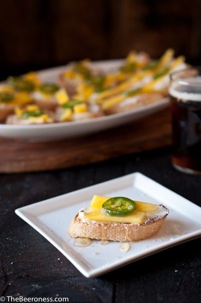 Goat Cheese Crostini with Beer Pickled Jalapenos and Mangos